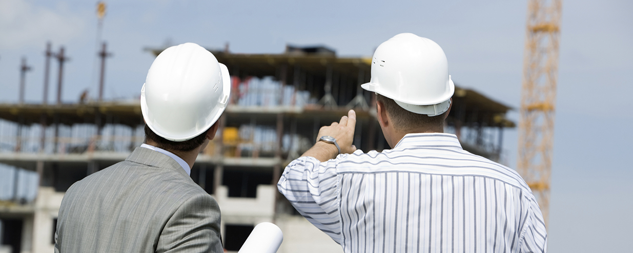Pointing Two construction contractors