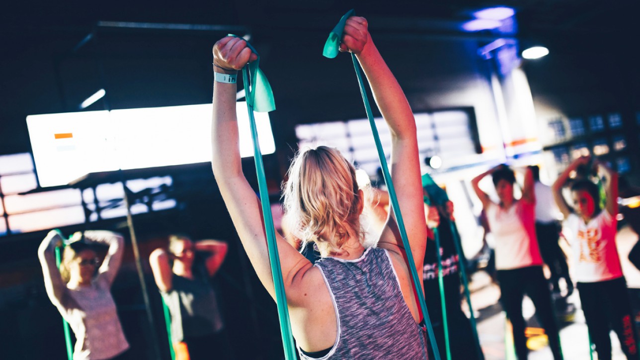 woman working out with bands