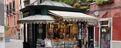 Kiosk with man selling magazines